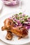 Two Spicy Glazed Roasted Chicken Drums with Salad