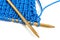 Two spokes with knit blue woolen cloth isolated macro