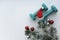 Two sports dumbbells, Christmas tree with Christmas balls, snowflakes, Santa hat on a white background. Christmas sports flatly