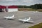 Two sports planes, one small passenger airplane and one amphibian aircraft
