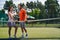 Two sports players with rackets talking before the game