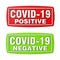 Two stamps with text COVID-19 positive and COVID-19 negative. COVID-19 coronavirus red and green rubber stamp.