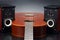 Two stereo audio speakers and classical acoustic guitar