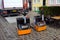 Two Still electric pallet trucks.