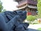 Two stone lions and pagoda in Chinese Buddhist temple Huayan Monastery