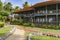 Two-storey wooden bungalows among a beautiful garden