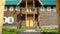 Two-storey wooden house, view of the front porch and veranda. HD