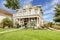 Two story american house with white column porch