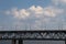 A two-story bridge over the Dnieper river, railway and automobile in Ukraine to the cities of the Dnieper on the background of the