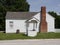 Two-story white house at Missouri Town Living History Museum in Lee's Summit, Missouri