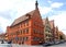 Two streets converge with several houses with different colors in the town of Dinkelsbuhl in Germany