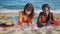 Two student girls preparing for tests on sandy beach