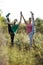 Two supple athletic women working out together