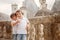 Two sweet boys, brothers having fun while walking around a castle