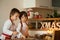 Two sweet children, boy brothers, preparing gingerbread cookies