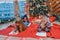 Two sweet children are writing message to Santa Claus.