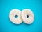 Two sweet donut on blue background