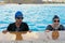 Two swimmers preparing to race at the swimming pool.Natural light ambient