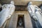 Two tall Montenegrin statues standing either side of the entrance to the Mausoleum of Njegos,Lovcen Mountain and National Park,