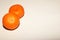 Two tangerines on white background with empty space for content