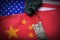 Two tanks face to face on USA and China national flag background. Refer to conflict between two countries is heating up. China and