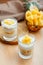 Two tasty pineapple desserts. Breakfast dessert with oat granola, greek yogurt and pineapple in layers in glass with