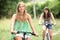 Two teenage girls cycling