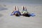 Two Teenage Girls Sunbathing at the Beach