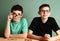 Two teenager boys in myopia glasses close up