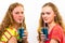 Two teenagers drink blue soda