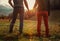 Two teens hand in hand romantic walk by the autumnal mountains