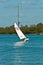 Two teens sailing in back bay of tropical Gulf of Mexico