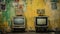 Two Televisions In Techno Shamanism Style In Front Of Yellow Wall