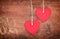 Two Textile pendent hearts