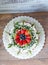 two-tier cream cheese wedding cake with blueberries and strawberries