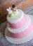 Two-tier fondant wedding lace cake with bear and bunny