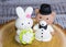 Two-tier fondant wedding lace cake with bear and bunny