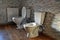 Two toilets in the attic of a residential building. Children`s toilet