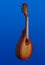 Two-tone red and yellow mandolin isolated on blue background.