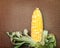 Two tone of sweet Corn on brown wickerwork background