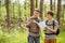 Two tourist determine the route map and navigator