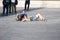 Two tourist exhausted lying on the ground