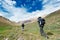 Two tourist hiking in india mountains