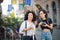 Two tourist women on street