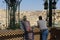 Two tourists gaze over the ancient medina of Fes Morocco