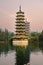 Two towers in Guilin city, China at sunset