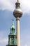 Two towers - TV Tower in East Berlin and the bell tower of St. Mary`s Church