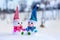 Two toy snowmen in winter Ð¾n nature. Friendship and love concept_