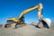 Two track-type excavator machines at earthmoving work