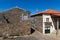 Two traditional colorful houses in the historic village of Castelo Mendo, in Portugal